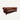 A classic brown leather Chesterfield sofa with deep button tufting, rolled arms, and dark wooden legs
