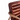 Close-up of a brown leather armchair with ribbed cushioning and a curved wooden arm on a white background.